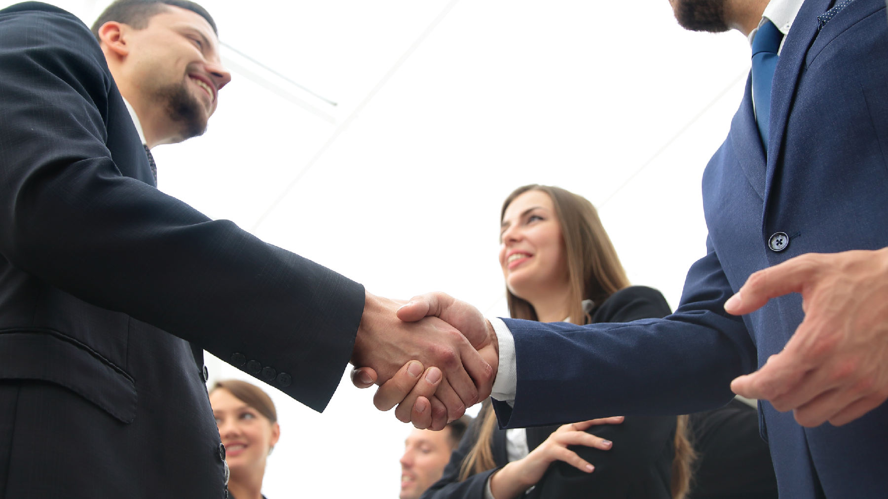 stock image of business people shaking hands