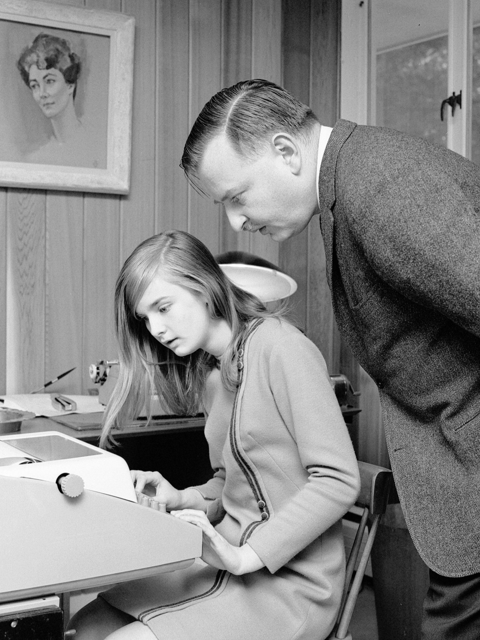 John Kemeny and his daughter Jennifer type at a word processor