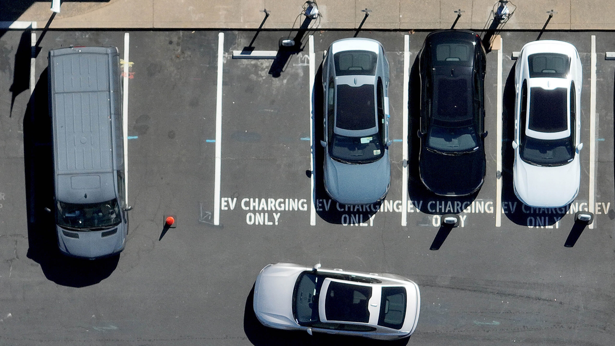 A Polestar electric car prepares to park at an EV charging station on July 28, 2023 in Corte Madera, California.