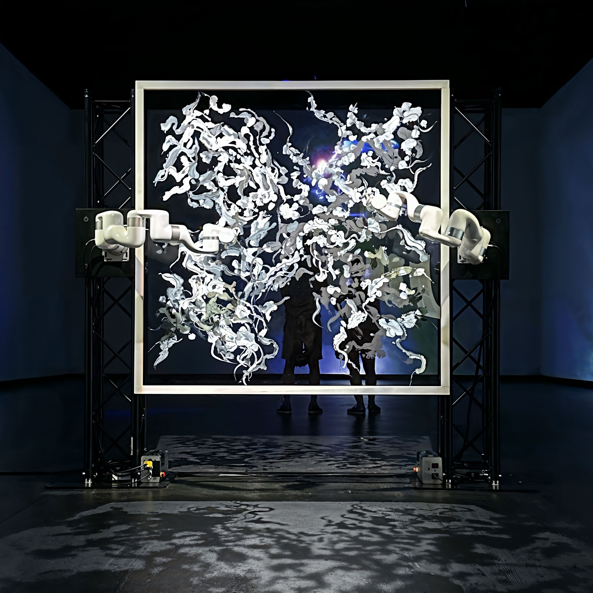 A frame of glass hanging in space of a dark gallery with two robot arms attached